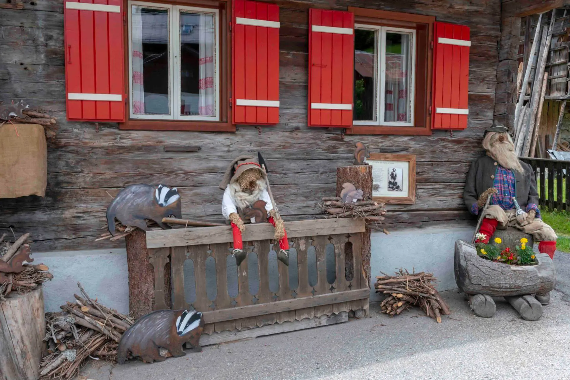 Cima Sappada House Facade With Wooden Animal Decorations