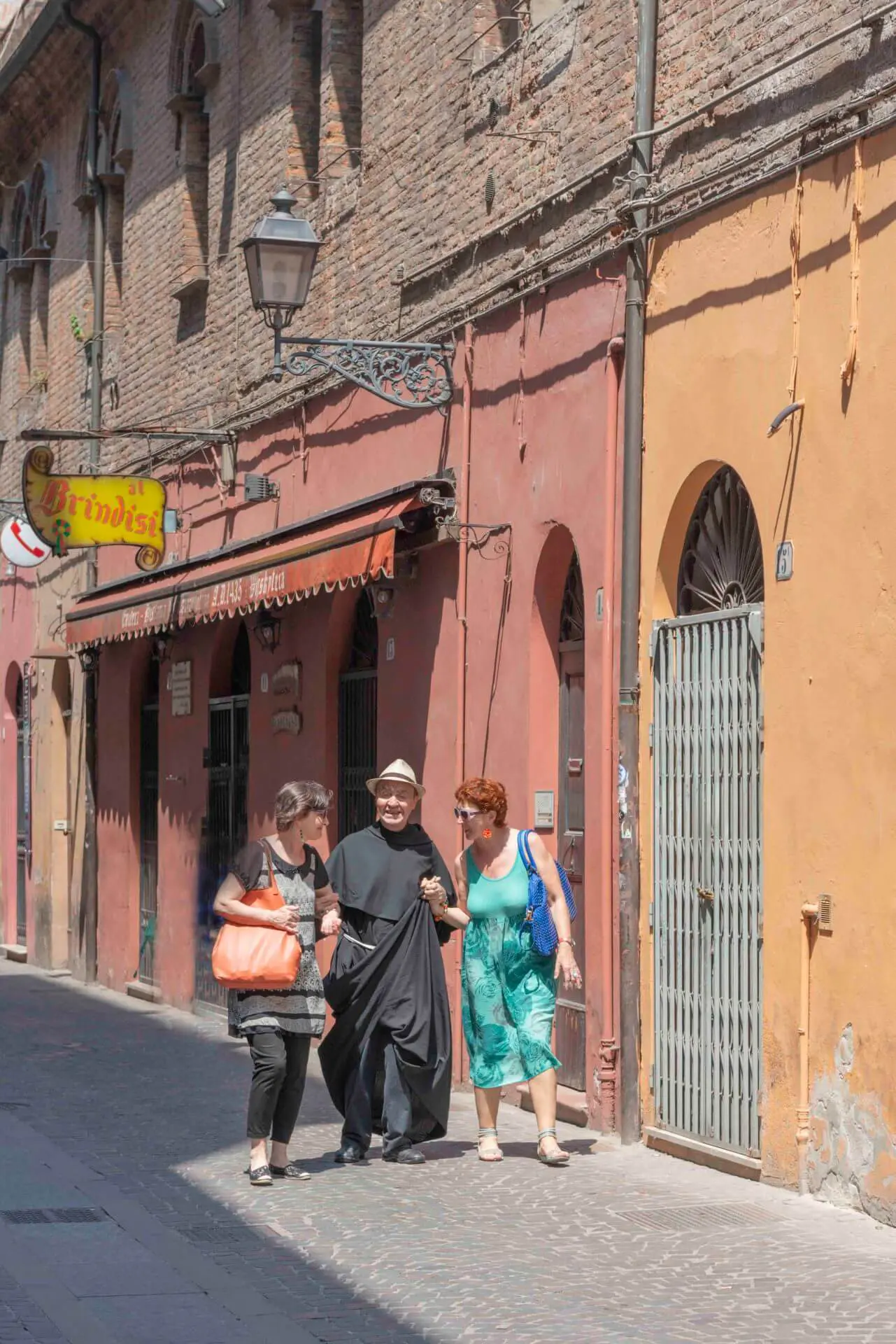 People Walking and Talking on a Pedestrian Street in Ferrara Italy